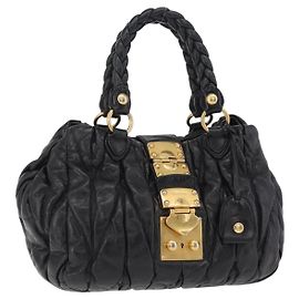 Bolsa de mão Miu Miu em couro preto e dourado Auth mr3040A
