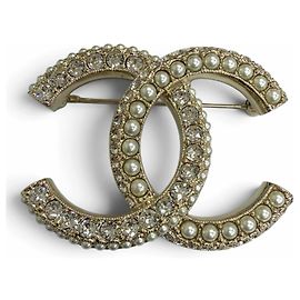 Broche Chanel Coco Mark con strass y perlas falsas