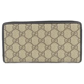 Cartera larga Gucci GG EMBLEM de lona GG suave