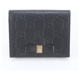 Carteira Bi-fold em couro Guccissima Ribbon Gucci