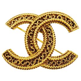 Broche Chanel Coco Mark banhada a ouro