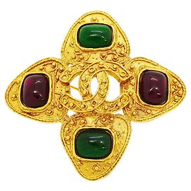 Spilla Chanel in oro e Gripoix