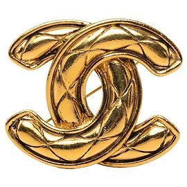 Broche acolchado Chanel Gold CC chapado en oro
