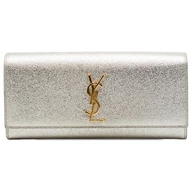 Autre Marque Clutch Cassandre Saint Laurent em couro de bezerro metalizado dourado