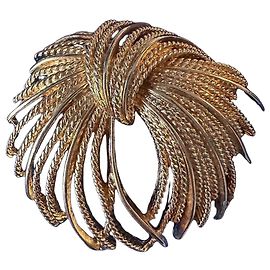 Autre Marque Broche vintage de metal dorado