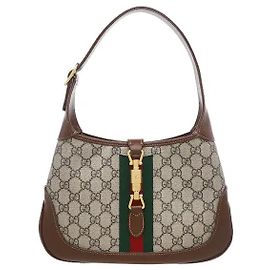Gucci O material de lona Supreme ecológico, capturando uma sensibilidade tradicional, oferece um peso leve e uma forte resistência a pequenas manchas ou riscos quotidianos, apresentando uma aparência excecional