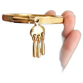 Hermès bracciale modello Charm Mall in metallo dorato con profilo in lucertola camel