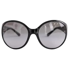 Lunettes de soleil Chanel noires en plastique