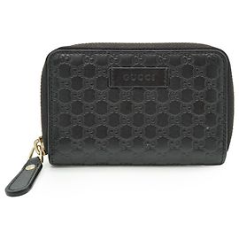 Gucci Portacarte e portafoglio compatto con zip Black GG Microssima