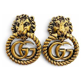 Pendientes de clip Gucci GG Marmont Lion Head