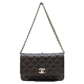 Sac à bandoulière portefeuille Chanel Classic Caviar avec chaîne partiellement strassée