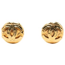 Pendientes de clip redondos chapados en oro Chanel Gold CC