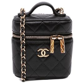 Chanel Mini Vanity Case en piel Caviar negra con asa y estuche de cuidado
