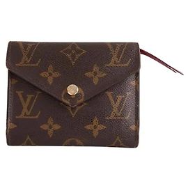 Portafoglio Louis Vuitton in pelle marrone