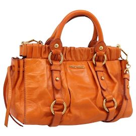 Borsa a mano Miu Miu con fiocco laterale in pelle 2way Orange Gold Auth am12762V