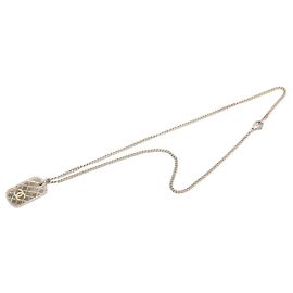 Collier pendentif plaque militaire matelassée en laiton CC argenté Chanel