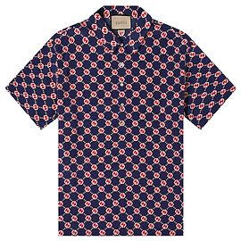 GUCCI - Polo de seda azul marino con motivo GG Gucci (T46)