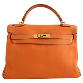 Bolso de mano Hermès Kelly 32 en cuero naranja