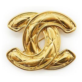 Chanel Spilla Vintage in metallo dorato logo CC Matelassé