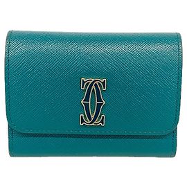 Cartier Münzbeutel aus grünem Leder