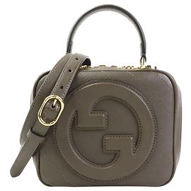 Mala de mão Blondie Gucci em pele de vitelo matelassé castanha com pega superior