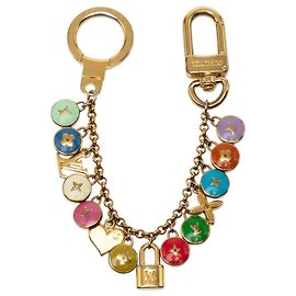 Chaveiro e pingente de bolsa Louis Vuitton em ouro banhado a ouro e esmalte Pastilles