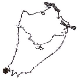 Autre Marque Collar Dior de metal plateado con colgantes de estrella, lazo y CD