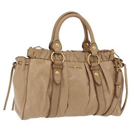 Sac à main Miu Miu en cuir 2way Beige Gold Auth 167736M
