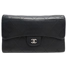 CARTERA CHANEL CLASSIQUE TIMELESS DE CUERO ACOLCHADO NEGRO