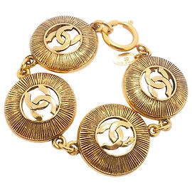 Pulsera de dijes Chanel chapada en oro