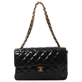 Bolso de hombro con cadena Chanel Double Face Matelasse en piel charol negra