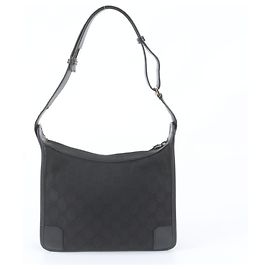 Bolsa de Ombro Gucci em Lona GG e Couro