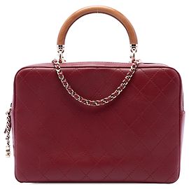 Bolso de asa superior Chanel Knock On Wood de piel de cordero acolchada roja