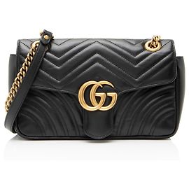 Borsa a patta media GG Marmont in pelle matelassé Gucci