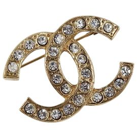 Broche CHANEL Cocostone metal Gold CC Auth 205477M