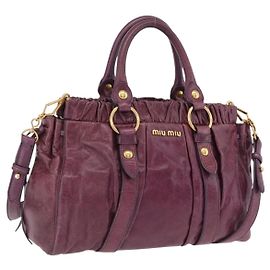 Miu Miu Handtasche aus Leder 2way lila gold authentisch 167734M