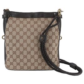 Bolsa de Ombro Gucci em Lona GG e Couro