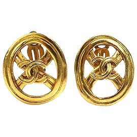 Boucles d'oreilles clips rondes plaquées or Chanel Gold CC