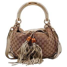 Borsa hobo Gucci in tela monogram con nappe