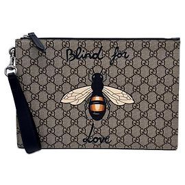 Clutch Gucci GG Supreme