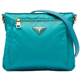 Borsa a tracolla Prada in Tessuto con rifiniture in Saffiano blu e chiusura a zip
