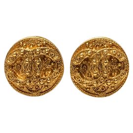 Boucles d'oreilles clips rondes Arabesque Chanel Gold CC plaquées or