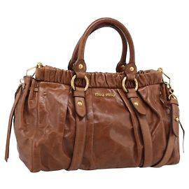 Borsa a mano Miu Miu con fiocco laterale in pelle 2way Brown Gold RT0383 Auth am12737M