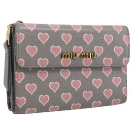 Portafoglio lungo Miu Miu in pelle grigio e oro Auth yk21007V