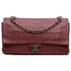 Borsa a tracolla Chanel Unlimited 31 Rue Cambon Reissue 2.55 Double Flap 228 in pelle di vitello goffrata rossa