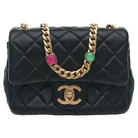Chanel A flap bag featuring distinctive special jewel ornamentation added to the chain strap, where soft lambskin material harmonizes with signature quilting for an even more delicate, luxurious aura.