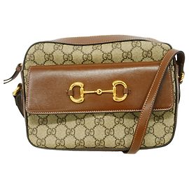 Bolsa de Ombro Gucci GG Supreme Horsebit