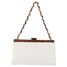 Borsa a pochette Chanel con catena in resina Pelle matelassé e resina con motivo tartaruga