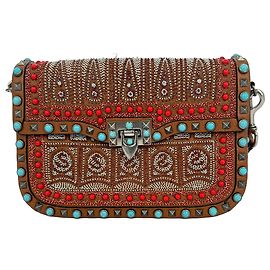 Borsa a tracolla Valentino Garavani Rockstud Rolling in pelle marrone
