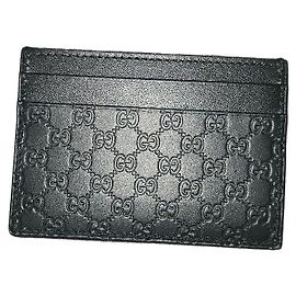 Gucci GG Tarjetero de cuero negro